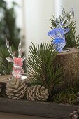 Christmas forest decoration with colored LED light deer