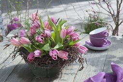 Tulips arrangement in wreath of birch vines