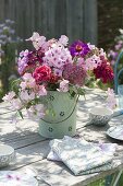 Fragrant table decoration of Phlox paniculata, Lathyrus