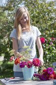 Putting cottage garden flowers bouquet