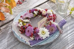 Small autumn wreath made with chrysanthemum (autumn chrysanthemum)