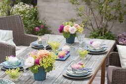 Table decoration with roses and lady's mantle