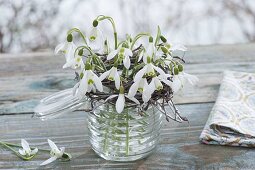 Posy with Galanthus nivalis in mason jar