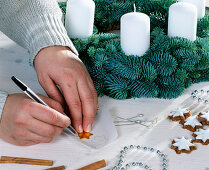 Tying an Advent wreath with silver fir branches. Step 4