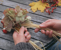 Bottle in leaf dress (2/6). Hydrangea (hydrangea), rose (rosehip) and rose