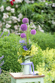 Modern bouquet of Allium 'Globemaster', Alchemilla mollis