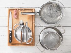 Kitchen utensils for making tapioca pudding with fruit