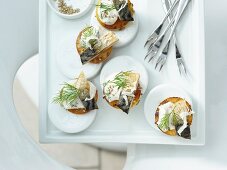 Potato crostini with horseradish and smoked mackerel