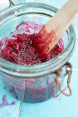 Preserved lingonberries in a jar