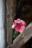 Bouquet of carnations tied with grasses