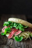 A bao burger with rump steak