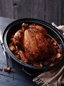 Roast chicken in an oven dish