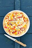 A quiche with pumpkin and peppers