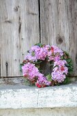 Luxuriant wreath of hydrangeas, berries and leaves