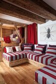 Fitted couch with striped cushions and scatter cushions with cubby bed in background