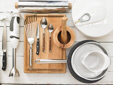 Kitchen utensils for the preparation of salad with beef filet and dressing