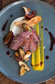Duck breast with herbs, mushrooms and celery puree