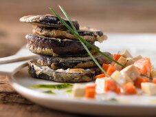 Aubergine piccata with winter vegetables and chive oil