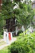 Laundry on washing line outside modernised barn