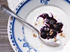 Cold soured milk with blueberries and amaretti