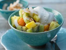 A tropical fruit salad with coconut and coconut yoghurt