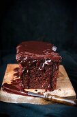 Chocolate cake with cranberry jam and chocolate glaze