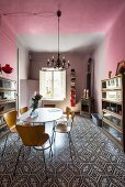 Dining room with patterned floor and two-tone walls and ceiling