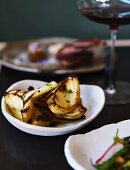 Marinated and grilled artichokes