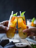 A basil plum fruit cocktail