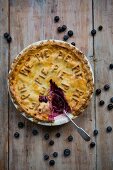 Fruit Pie with Slice Removed and Spoon