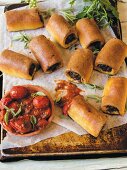 Bread rolls with a chard filling and tomato sauce