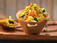 A vegetable and couscous dish with harissa