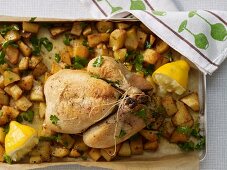 Roast chicken with potatoes and lemon