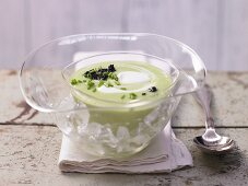 Cold avocado and cucumber soup with algae caviar and yoghurt