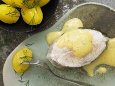Steamed cod with mustard sauce and salted potatoes