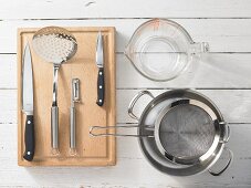 Kitchen utensils for making chicken fricassee with asparagus