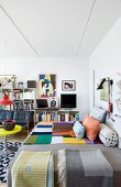 Eclectic mixture of styles and graphic patterns in living room