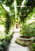 Fountain from 1865 under a pergola