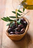 Fresh olives and olive oil