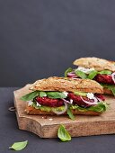 Beetroot burger with avocado cream and feta cheese