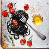 Black spaghetti with tomato sauce