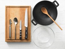 Kitchen utensils for making a wok dish with chicken