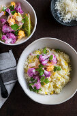 Risotto with yellow and purple cauliflower florets