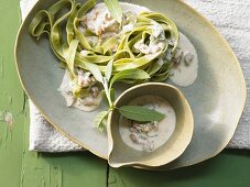 Green tagliatelle with gorgonzola sauce, walnuts and sage