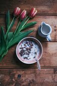 Cacao buckwheat granola with almond milk for breakfast