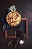 Cauliflower pie with cheese and almond flakes