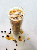 Iced coffee with ice cubes in a glass