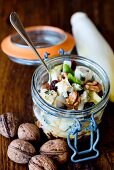 Lunch in a glass jar: chicory salad, walnuts, blue cheese, sultanas, sherry and walnut oil