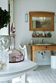 Sink integrated in old washstand in bathroom