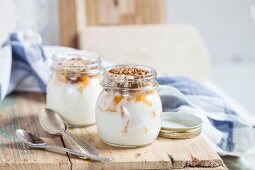 Yogurt with orange pieces and chopped nuts